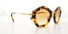 Picture of Miu Miu Sunglasses MU06OS